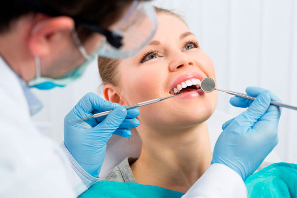 Лечение зубных каналов: основные симптомы и методы лечения